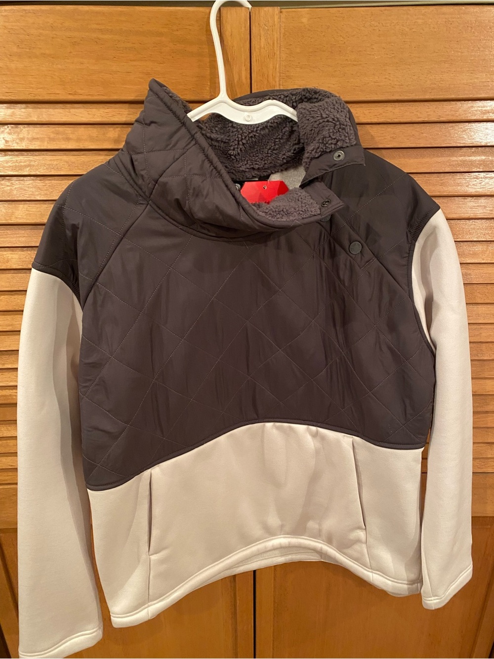 The North Face Two-Tone Teddy Pullover Jacket - Black and Cream